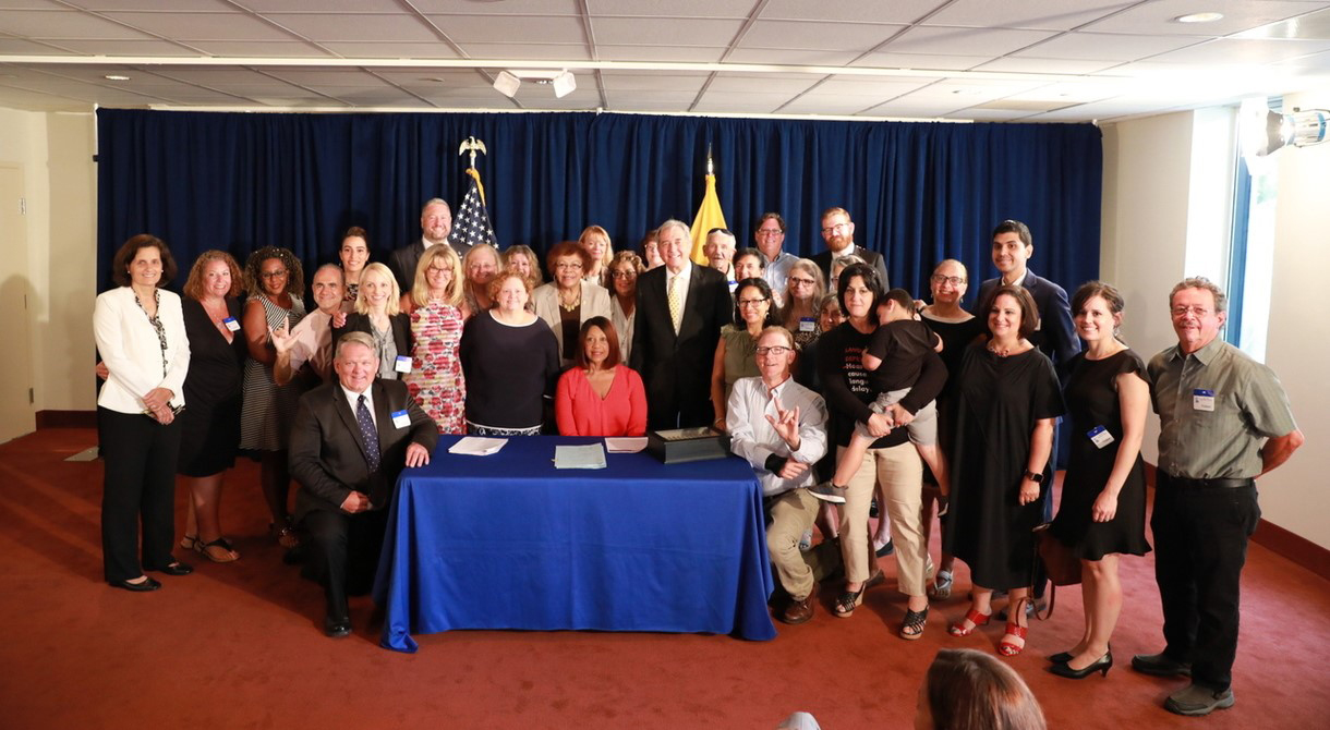 Acting Governor Oliver Signs Legislation Assisting Hard of Hearing Community